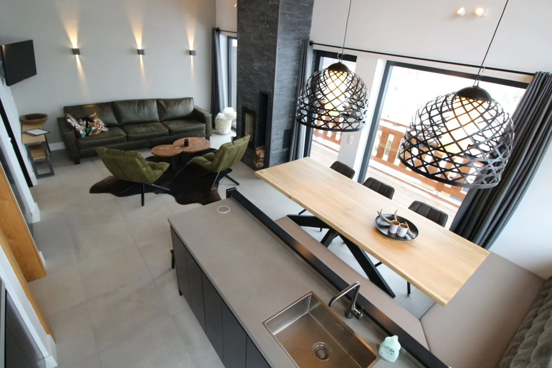 Fully equipped open kitchen with island and dining table